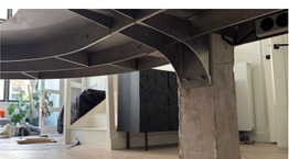 Underside of the table where it meets the column