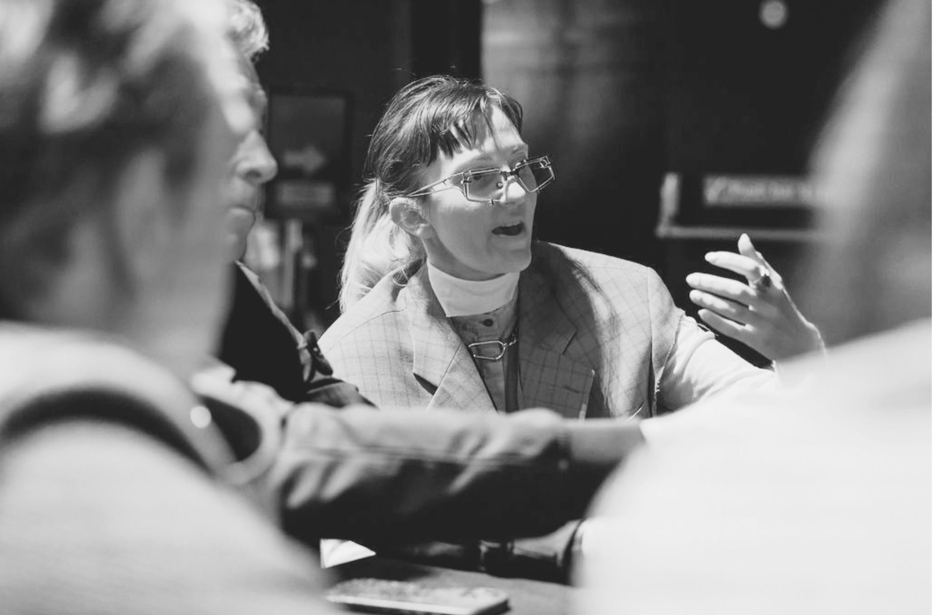 Susan Isko mid-argument in conversation at a World Experience Organization gathering