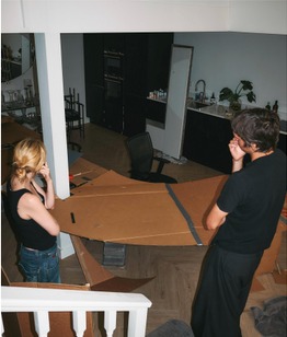 Susan and a collaborator laying out the template