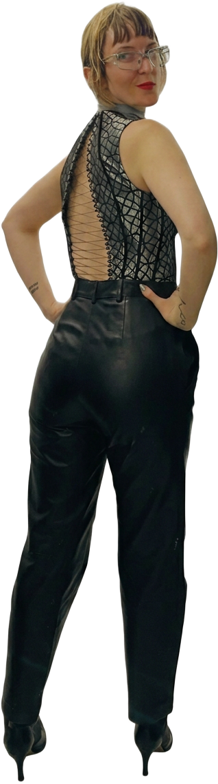 Black lace-up backless top with black leather trousers and heeled boots